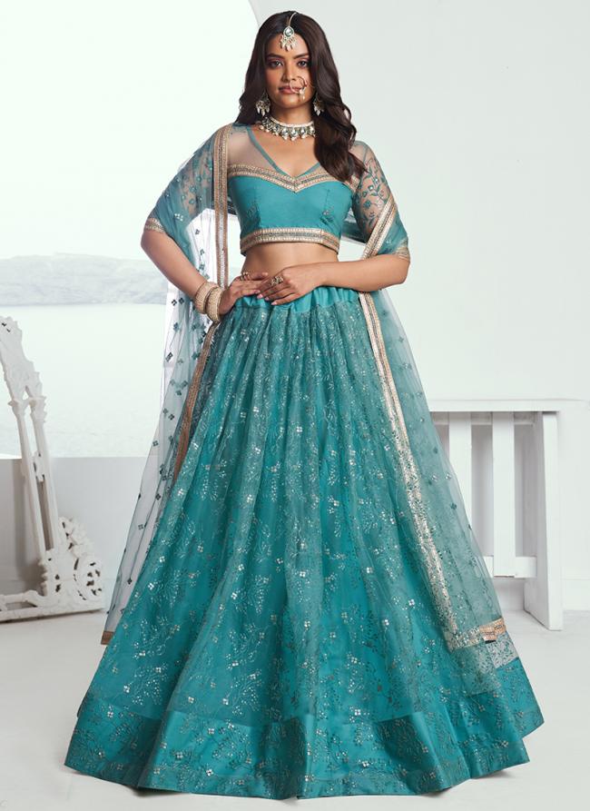 Butterfly Net Rama Green Wedding Wear Sequins Work Lehenga Choli